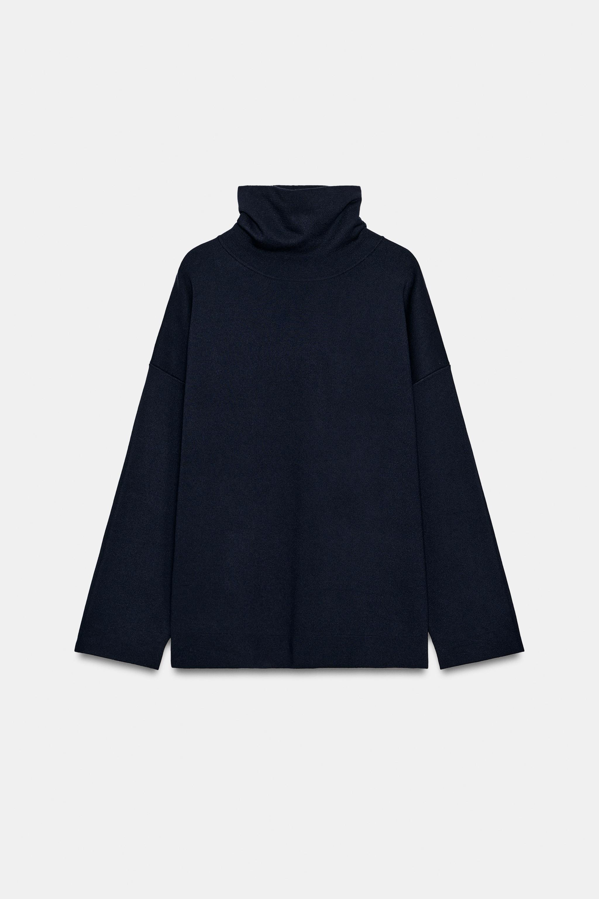 PULL EN MAILLE À COL MONTANT